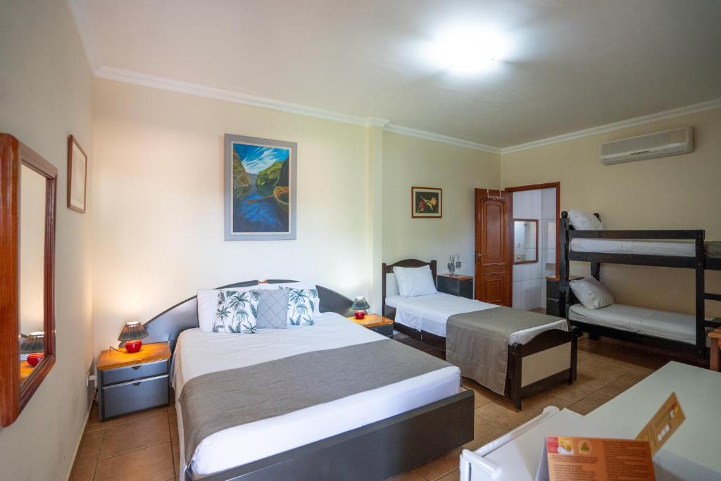 Quarto Standard Quíntuplo - Pousada Galeria Artes